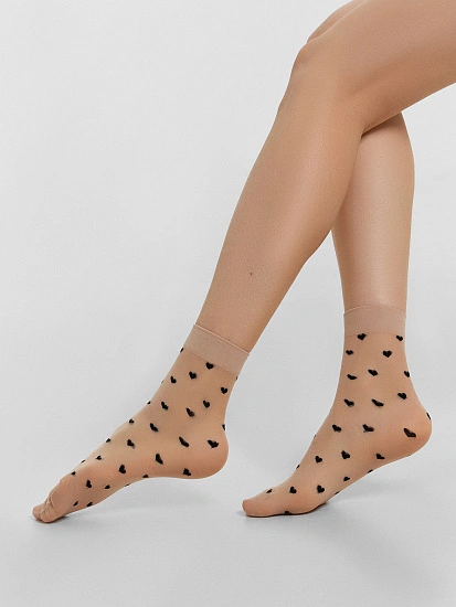 картинка Женские высокие полиамидные носки в сердечко от магазина стильной одежды Mark Formelle