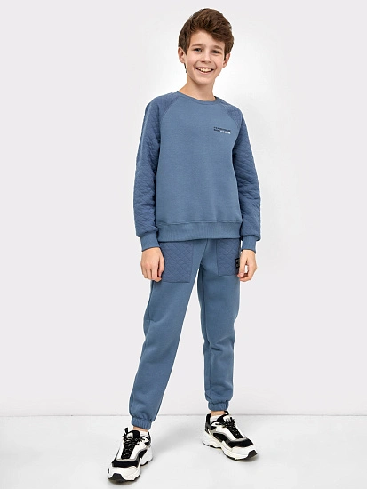картинка Теплый свободный джемпер синего цвета с изображением волка для мальчиков от магазина одежды для мальчиков от бренда Mark Formelle