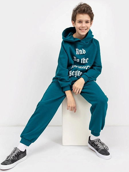 картинка Теплые джоггеры изумрудного цвета для мальчиков от магазина одежды для мальчиков от бренда Mark Formelle