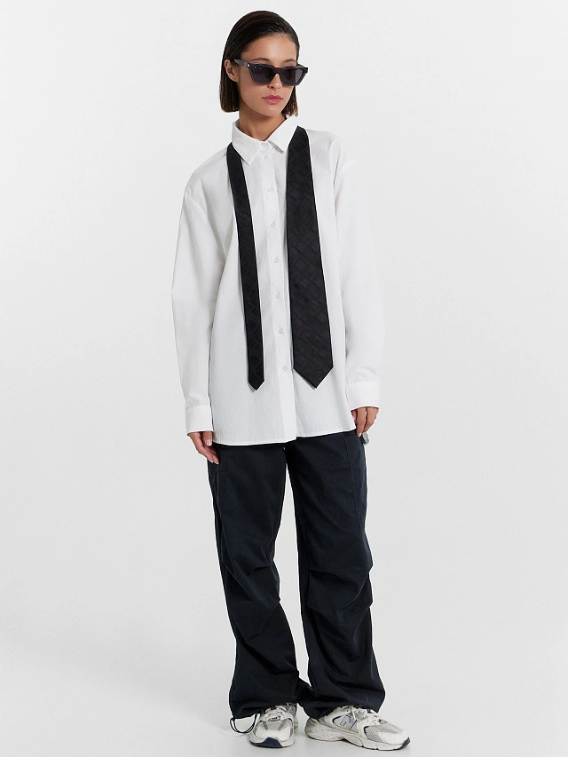 Брюки женские в черном цвете - 13