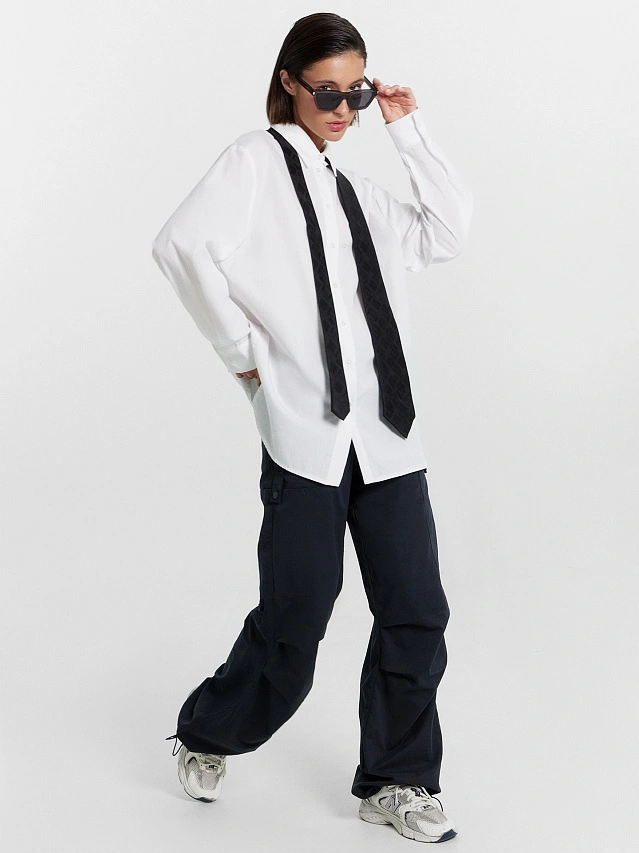 Брюки женские в черном цвете - 15