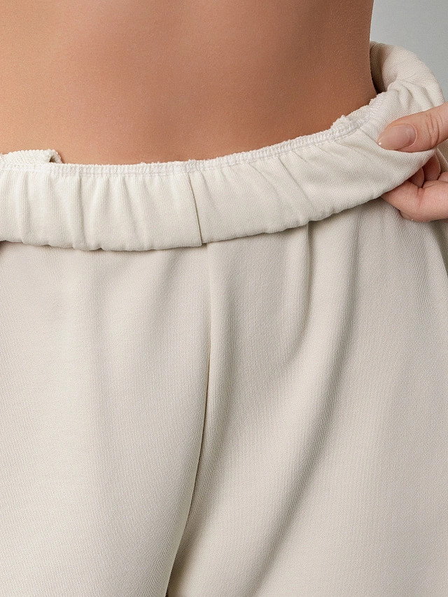 Брюки женские в бело-бежевом цвете - 6