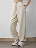 Брюки женские в бело-бежевом цвете