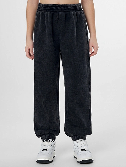 картинка Брюки для девочек черные с обработкой эйсид  от известного бренда одежды для девочек Mark Formelle