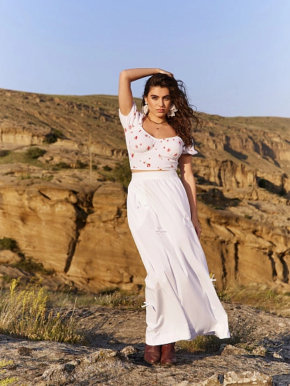 картинка Юбка женская белая с бантиками от магазина стильной одежды Mark Formelle