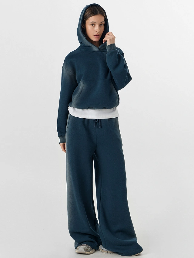 Брюки женские зеленые с декоративными потертостями - 7